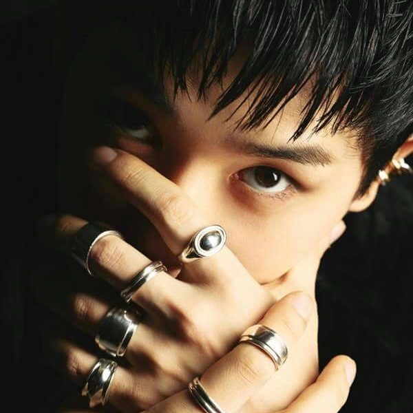 people-man-A-close-up-A-dark-lighting-A-silver-rings-A-intense-gaze