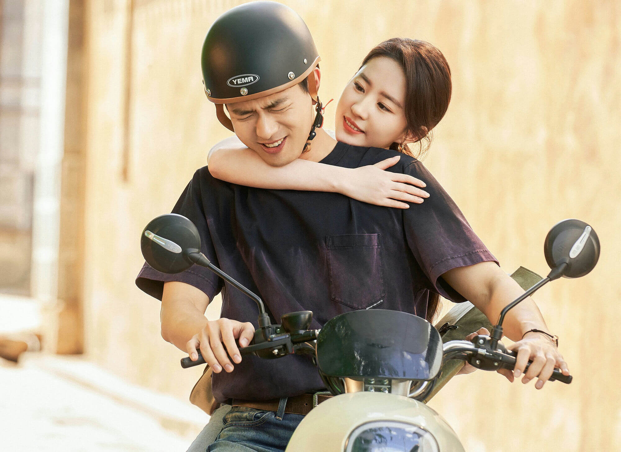 people-couple-A-riding a scooter-A-woman hugging man from behind-A-man looking strained-A-sunny outdoor setting