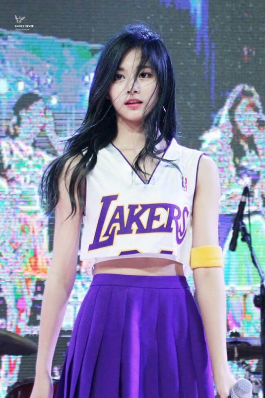 people-Mina (TWICE)-A-performing-A-Lakers crop top-B-purple pleated skirt-C-yellow sweatband