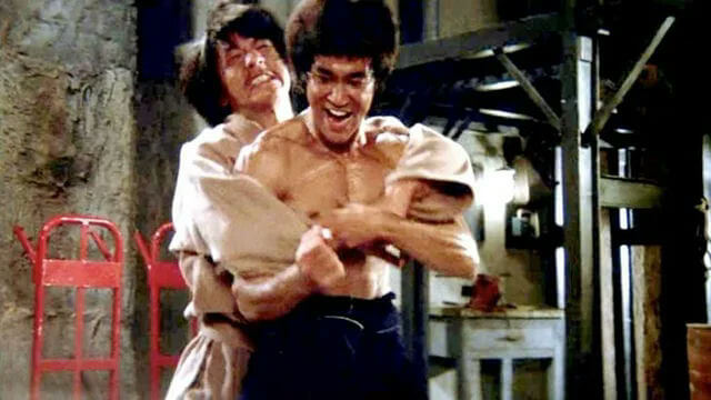 people-Two men-A-martial arts film-A-laughing-B-bear hug-C-muscular torso
