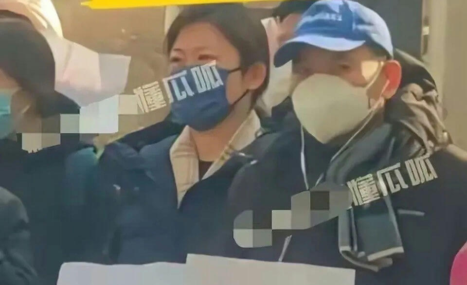 people-two people-A-wearing face masks-A-woman with blue mask-B-man with white mask and blue cap-C-dark clothing