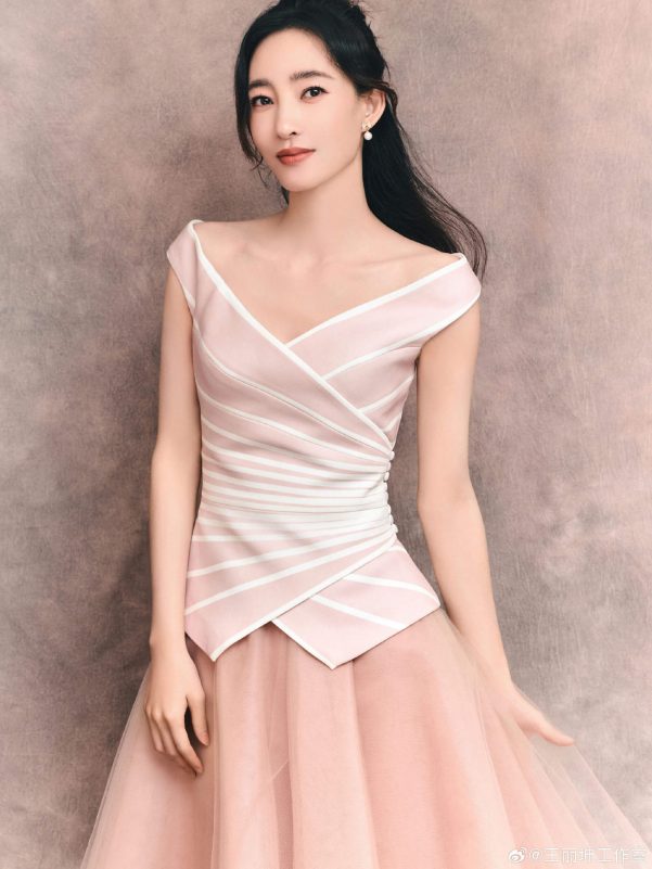 people-woman-A-pink and white striped top-B-off-the-shoulder neckline-C-pink tulle skirt
