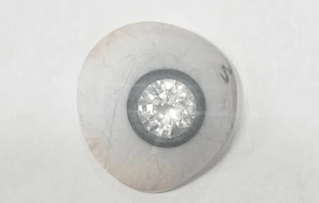 object-A-prosthetic-eye-A-diamond-A-jewelry-B-white-background-C