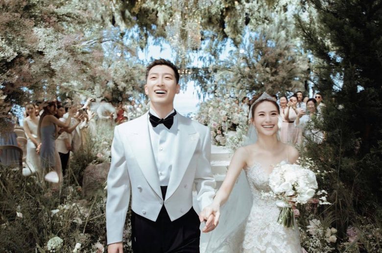 people-A-bride and groom-A-wedding ceremony-B-outdoor setting-C-joyful expressions