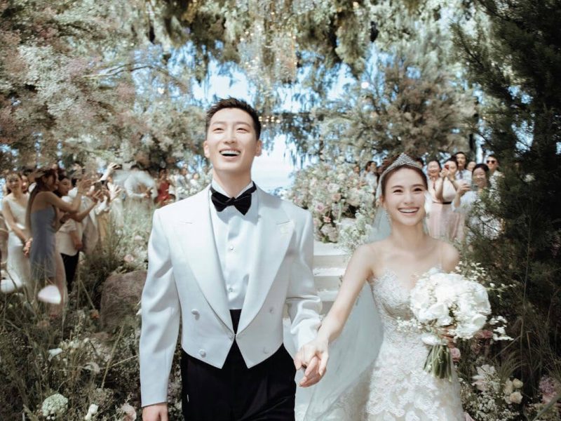 people-A-bride and groom-A-wedding ceremony-B-outdoor setting-C-joyful expressions