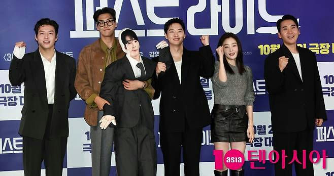 people-6-Korean-A-press-conference-A-cardboard-cutout-A-formal-attire-A-casual-attire-A-fists-raised