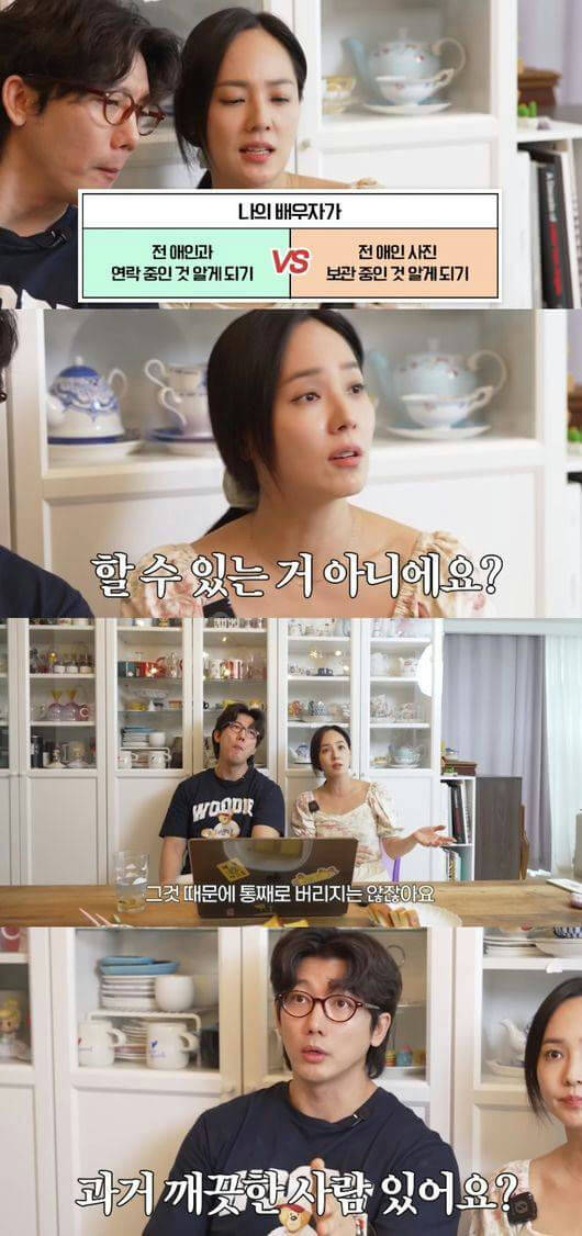people-Two people (a man and a woman) are visible in a split-screen or panel format, likely from a video interview or show-Woman-talking-Man-listening-The setting appears to be indoors, possibly a well-lit room with white shelving units displaying various ceramic items like teapots and mugs in the background-A text box in the first panel presents a hypothetical choice about a spouse's past involvement with an ex-lover versus keeping photos of an ex-lover-The woman speaks in the second panel, and the man speaks in the bottom panel, both with Korean subtitles present-Woman-concerned-Man-surprised