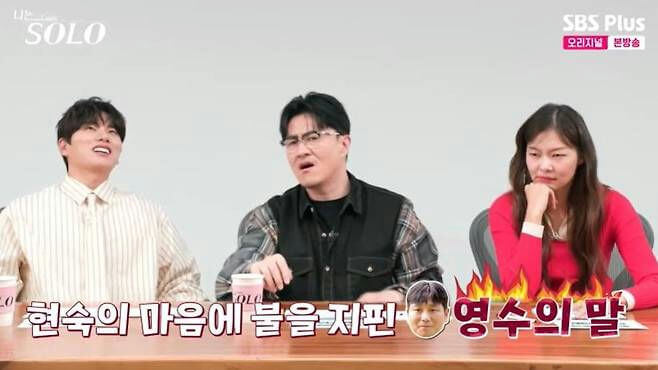 people-three people sitting at a table-Man on left looking up with wide eyes-Man in center looking disgusted with glasses-Woman on right pouting with hand on chin