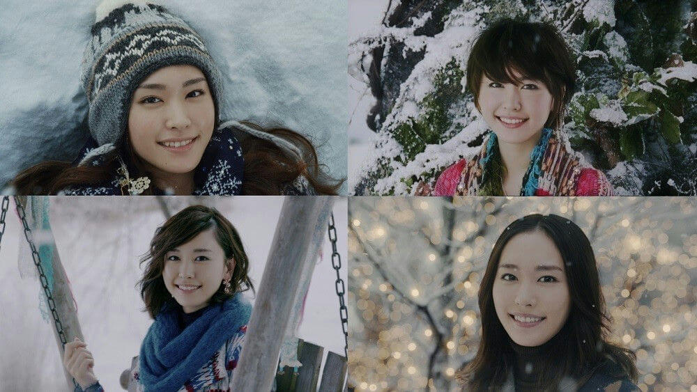people-four women-winter setting-smiling-outdoor activities
