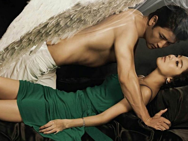 people-Two-A-man-A-woman-A-angelic-wings-B-intense-gaze-B-green-dress-C-sensual-pose
