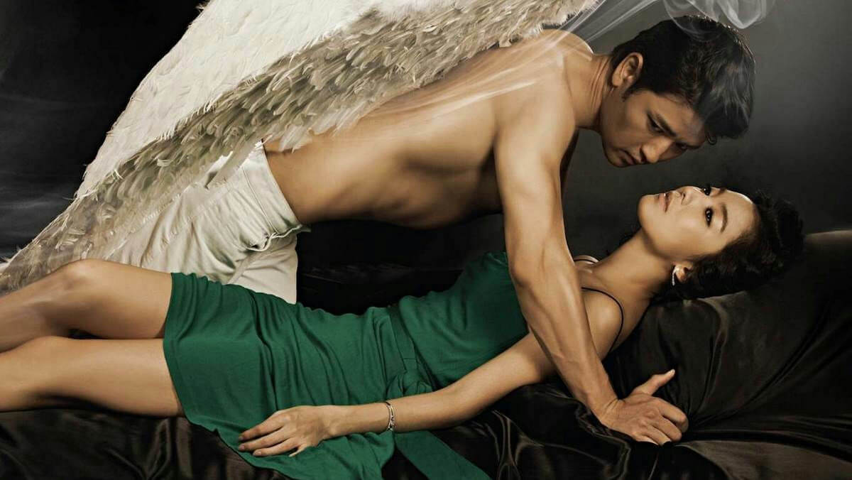 people-Two-A-man-A-woman-A-angelic-wings-B-intense-gaze-B-green-dress-C-sensual-pose