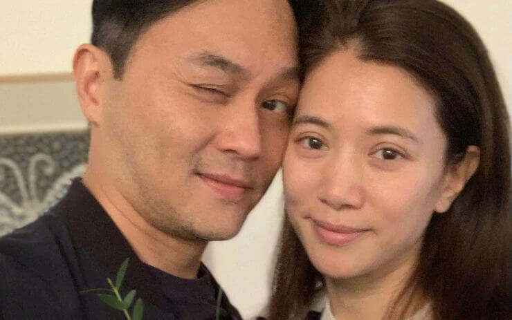 people-two people-A-couple-A-man winking-B-woman smiling-C-close up