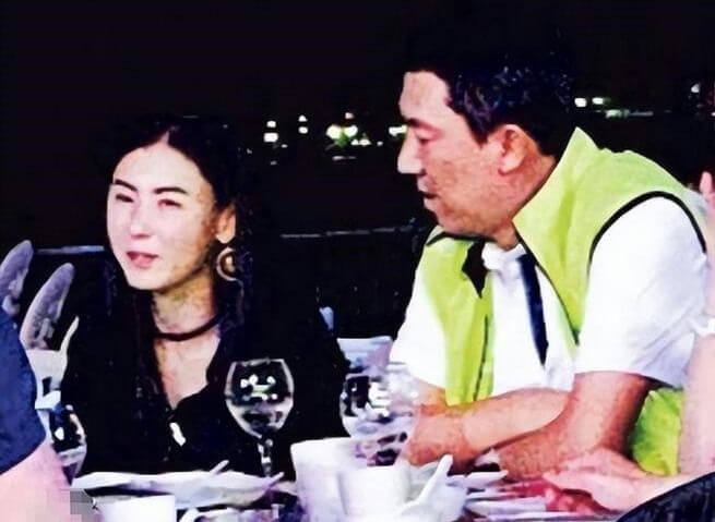 people-woman-dark hair-woman-choker necklace-man-lime green vest-dining-night