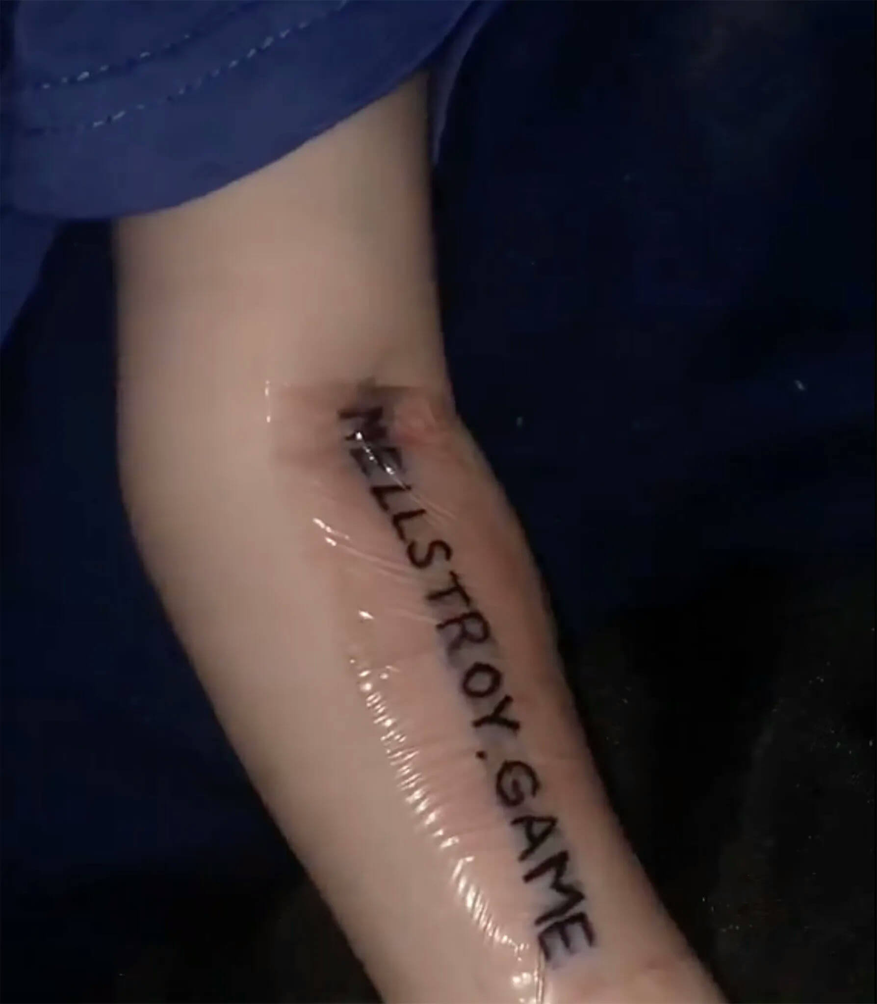 people-A-arm-A-tattoo-B-text-C-Hellstroy.Game