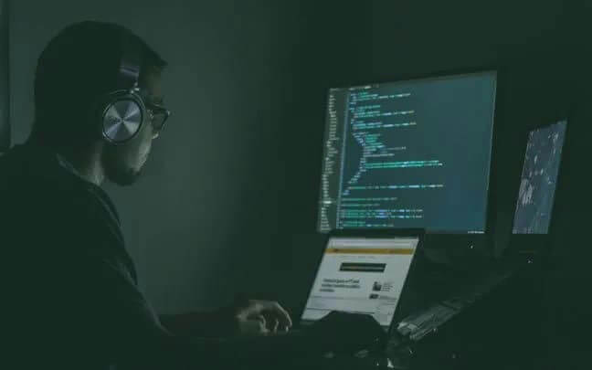 people-1-hacker-A-coding-A-headphones-A-darkness