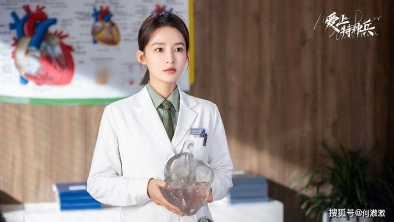 people-A-female doctor-A-white lab coat-A-holding heart model-A-medical setting