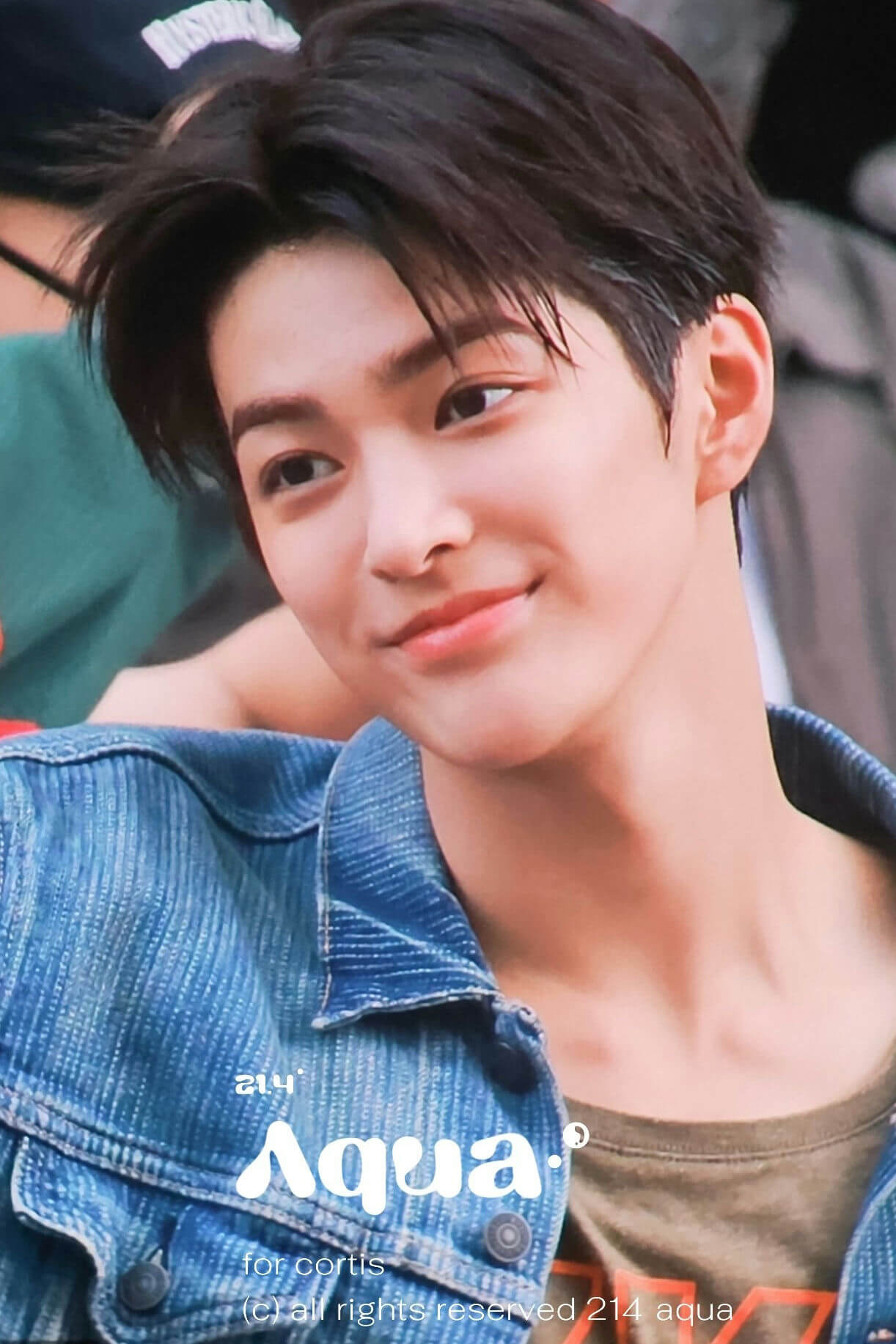 people-young man-A-smiling-A-dark hair-B-denim jacket-C