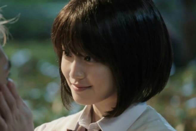 people-Young woman-A-short black hair-A-smiling-A-white collared shirt-A-intimate moment