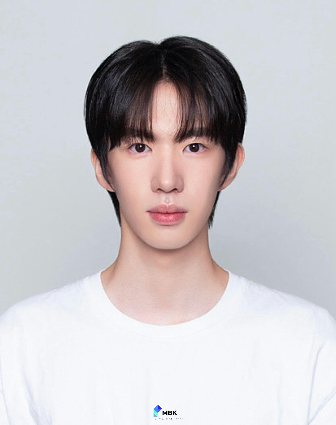people-young man-black hair-white t-shirt-MBK logo