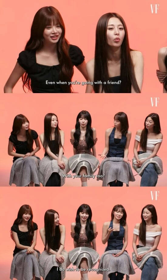 people-five women-A-sitting on chairs-A-speaking-B-interview setting-C-VF logo