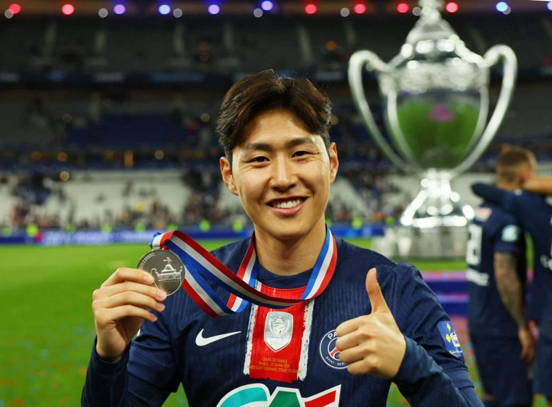 people-Asian man-A-soccer player-A-smiling-A-holding medal-B-giving thumbs up-C