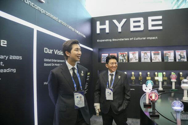 people-RM (BTS member)-A-Bang Si-hyuk (HYBE Chairman)-A-suits-B-HYBE booth-C-lightsticks