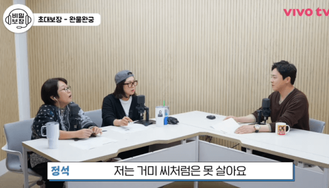 people-two women and one man-podcast recording-A-microphone-B-table-C-subtitle