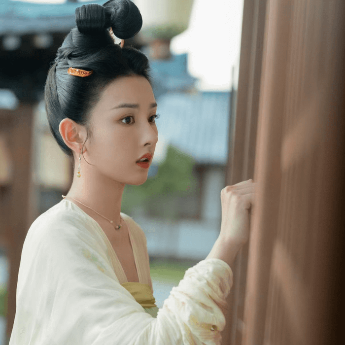 people-A-woman-A-Chinese-A-historical-costume-A-traditional-hair-bun-A-pale-yellow-dress-A-looking-sideways