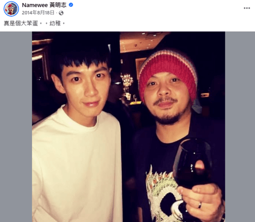 people-Two men posing for a photo-Man on the left-Young-Asian-Wearing a white long-sleeved shirt-Man on the right-Wearing a colorful knitted beanie-Holding a glass of red wine-Namewee (Malaysian rapper) is one of the men