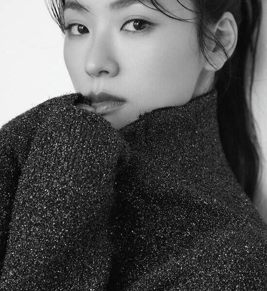 people-A-woman-A-close-up-A-black and white-A-sparkly sweater