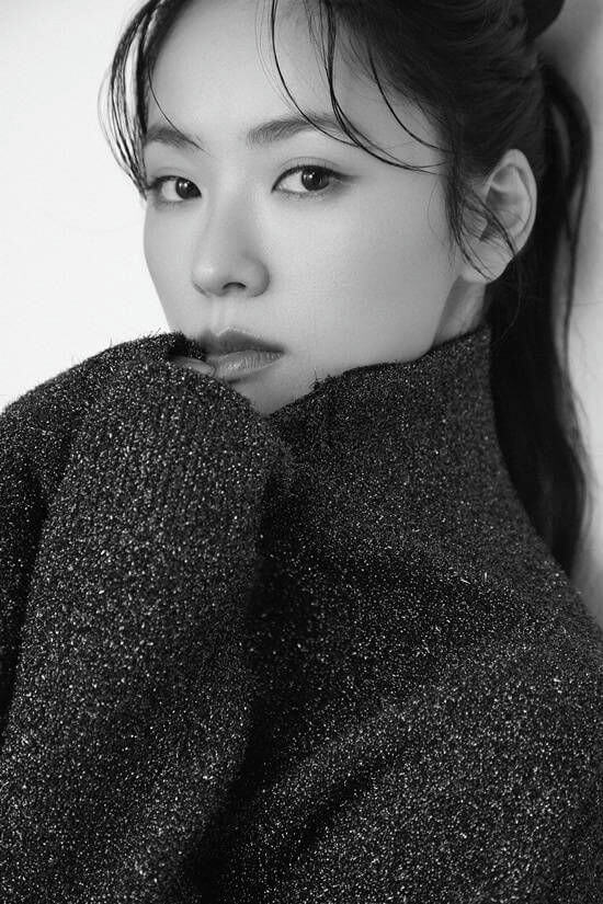 people-A-woman-A-close-up-A-black and white-A-sparkly sweater