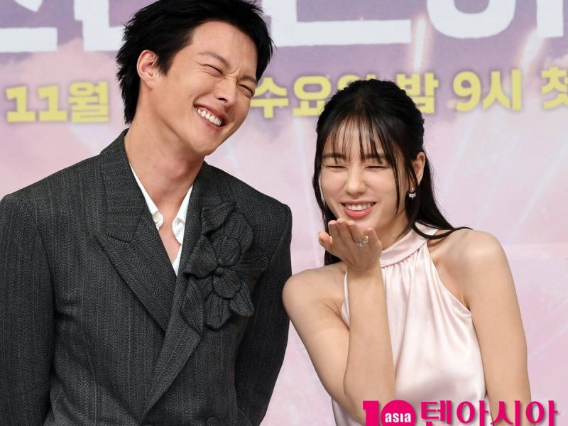 people-Man and Woman-smiling widely-Man-crinkled eyes-Woman-blowing a kiss-Woman-pink halter top