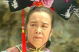 people-A-Chinese woman-A-traditional costume-B-headdress-C-concerned expression
