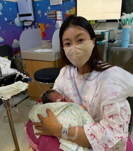 people-1-woman-A-baby-A-hospital setting-A-mask-B-IV line-B-newborn care-C