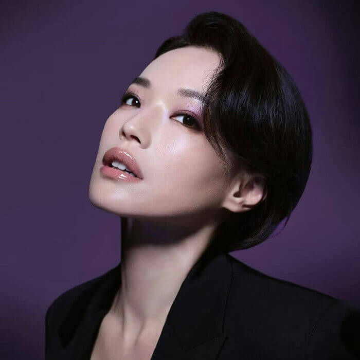people-woman-A-short black hair-A-purple background-A-glossy nude lips-B-smoky purple eyeshadow-C