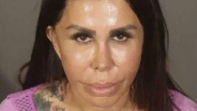 people-woman-A-mugshot-A-dark hair-B-tattoos-C