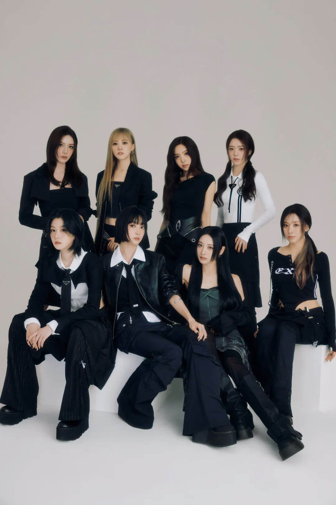 people-8-women-A-K-pop-A-black-attire-A-studio-portrait