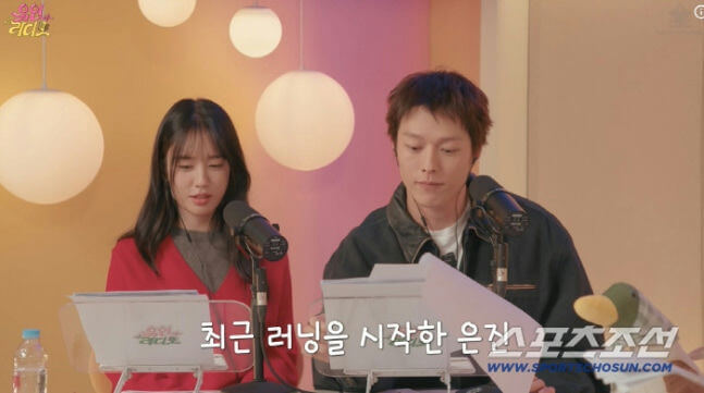 people-two people-A-broadcasting-A-radio show-A-microphones-A-scripts