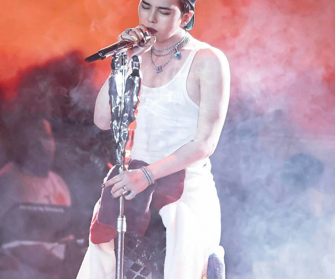 people-A-G-Dragon-A-singer-A-performing-A-white-tank-top-A-microphone-A-stage-lighting