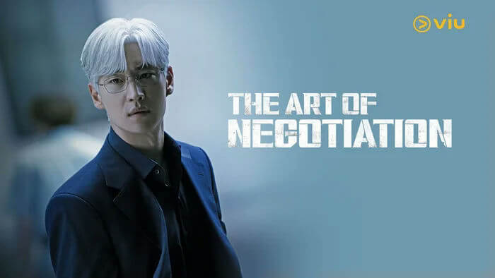 people-man-A-white hair-A-glasses-A-suit-A-title graphic-A-Viu logo