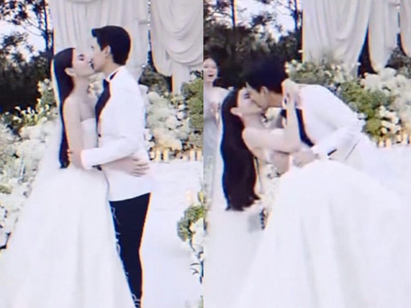 people-bride-and-groom-A-wedding-kiss-A-outdoor-setting-B-formal-attire-C