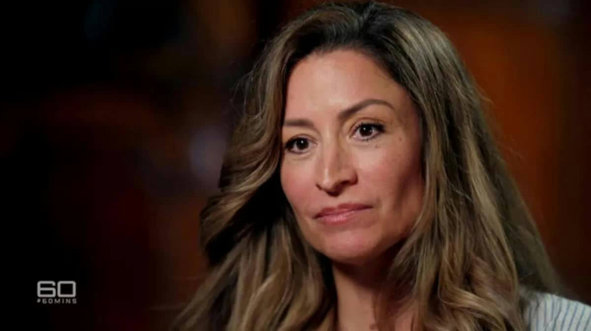 people-1-woman-A-interview-A-60-Minutes-A-brown-hair-B-serious-expression