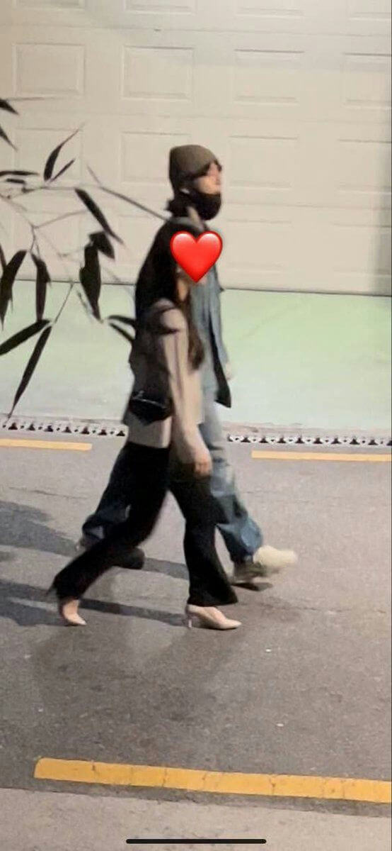 people-two-walking-A-nighttime-B-casual-clothing-C-face-obscured