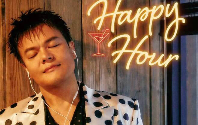 people-J.Y. Park-listening to music-relaxed expression-polka dot jacket-neon sign-Happy Hour