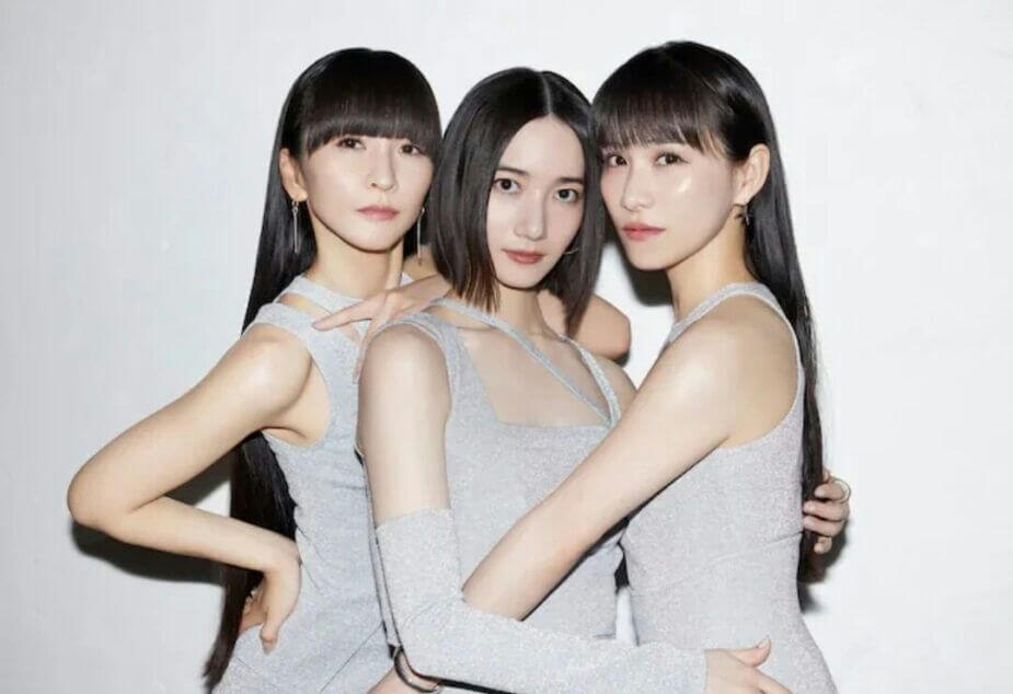 people-3-Japanese idols-A-silver sparkly dresses-B-long dark hair-C-posing closely