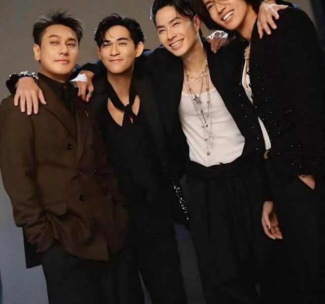 people-4-Asian-men-A-posing-for-a-photo-A-smiling-A-dressed-in-suits-A-black-and-brown-attire