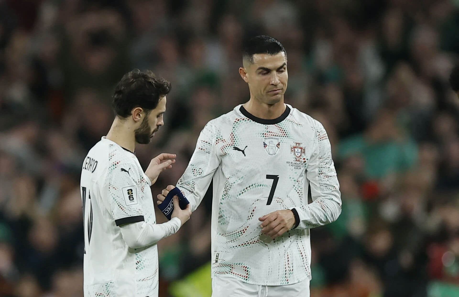 people-Cristiano Ronaldo-A-Bernardo Silva-A-football players-B-passing armband-C-soccer match
