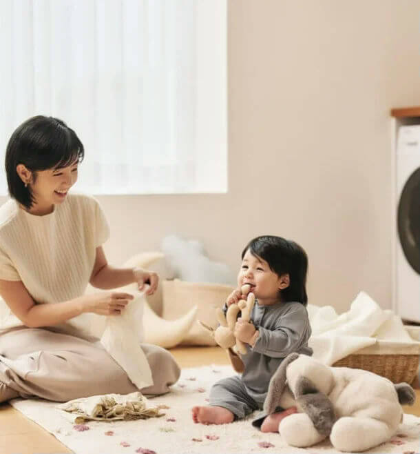 people-woman-A-baby-A-smiling-B-playing-C