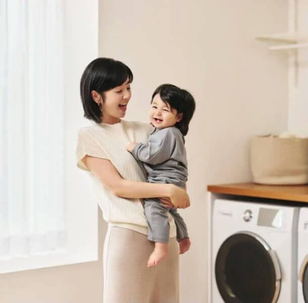 people-mother-child-laughing-laundry room