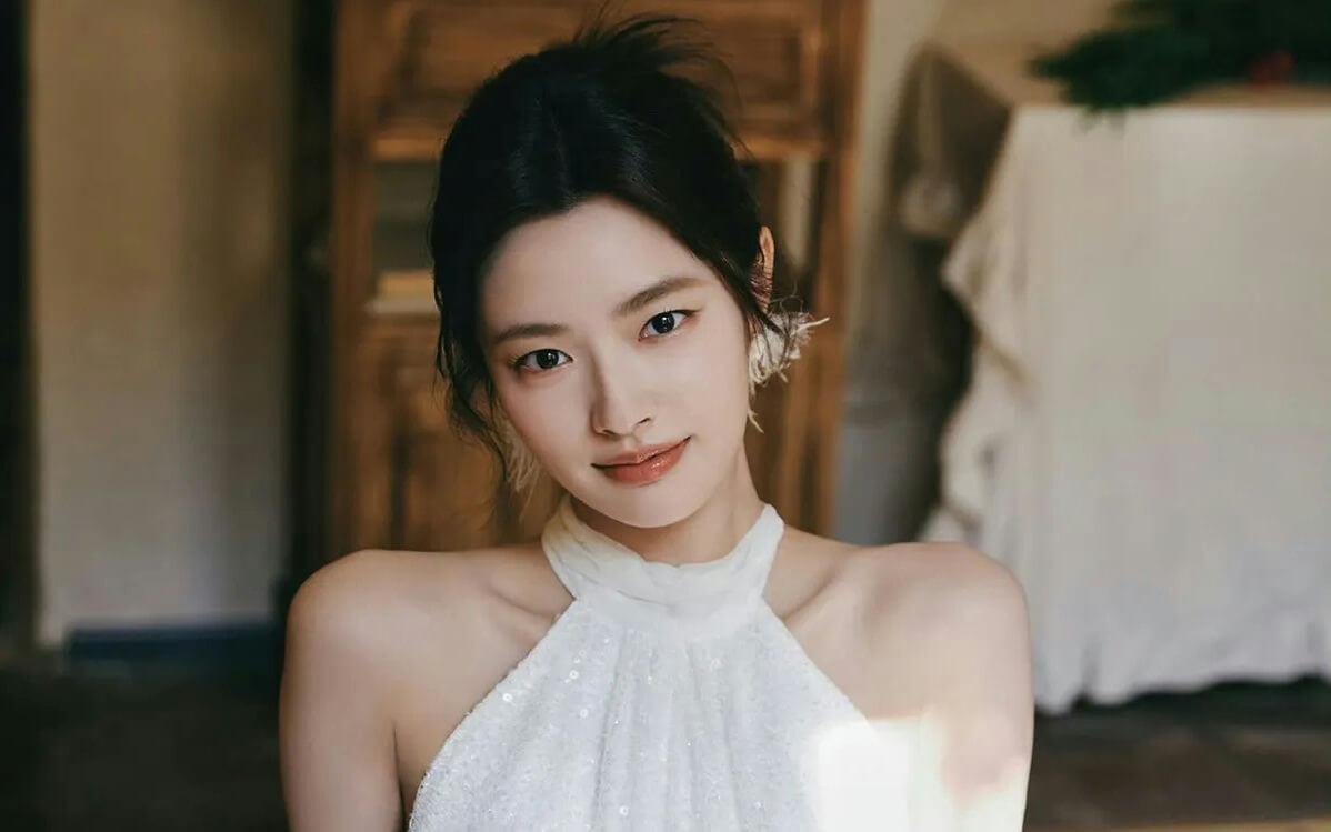 people-woman-A-white halter top-B-dark hair updo-C-soft lighting